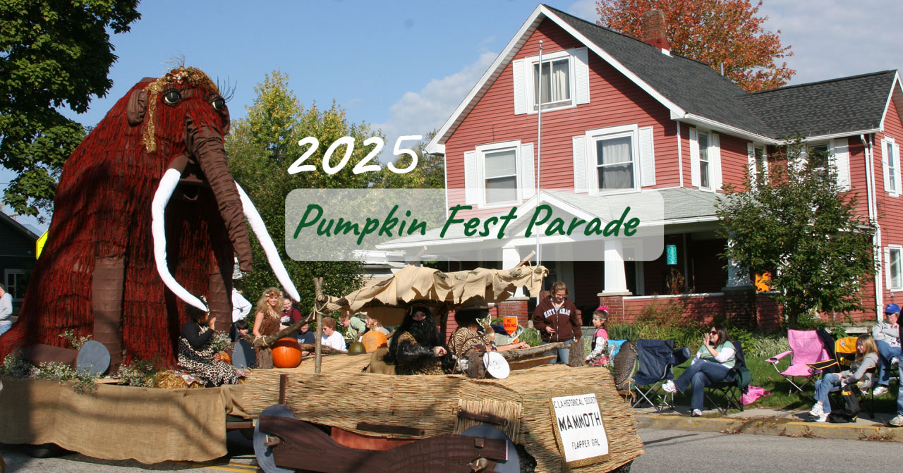 Conneaut Lake Park Pumpkinfest 2024 with historical image of the parade with a wooly mammoth float